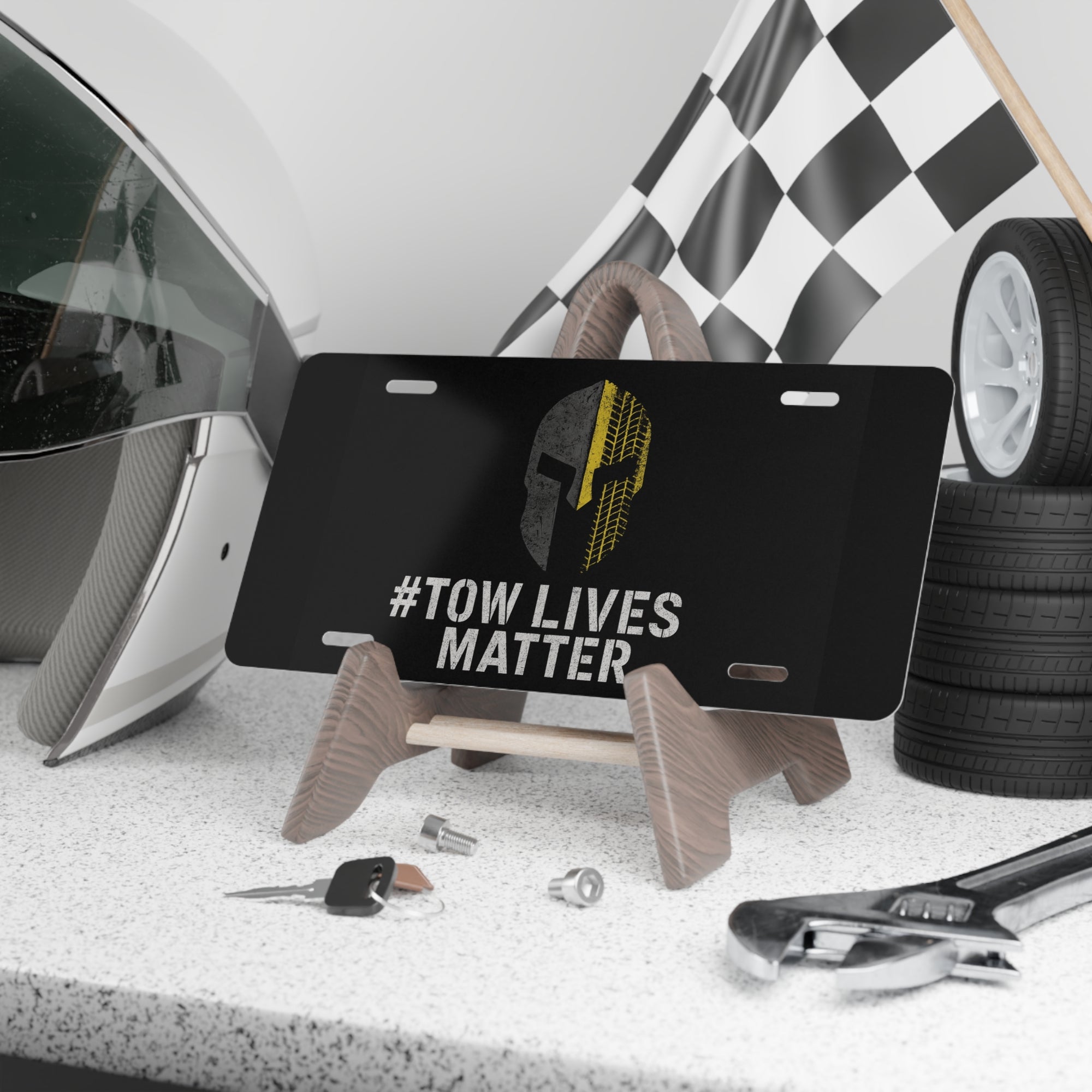 Tow Lives Matter Vanity Plate – Spartan Helmet with Yellow Tire Track for Tow Truck Operators