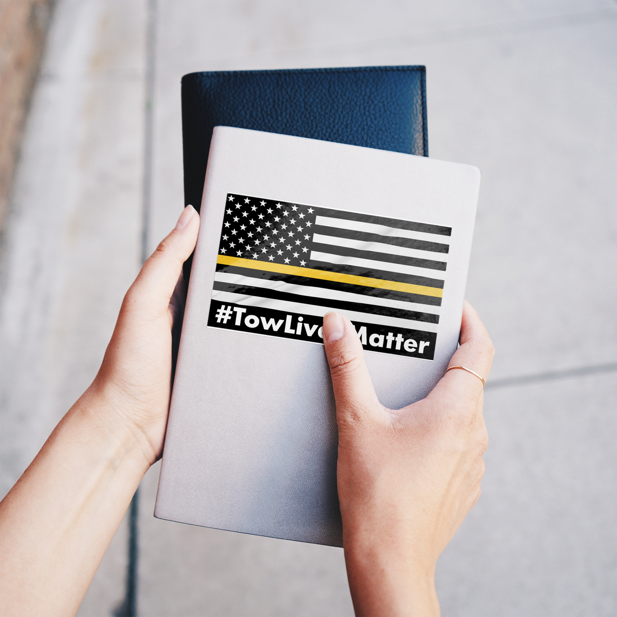 Towlivesmatter_Sticker_WhiteRecSticker_Notebook_H_Mockup.png