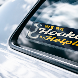 Were_Hooked_On_Helping_Others_WhiteBumperSticker-CarWindow_Mockup.png