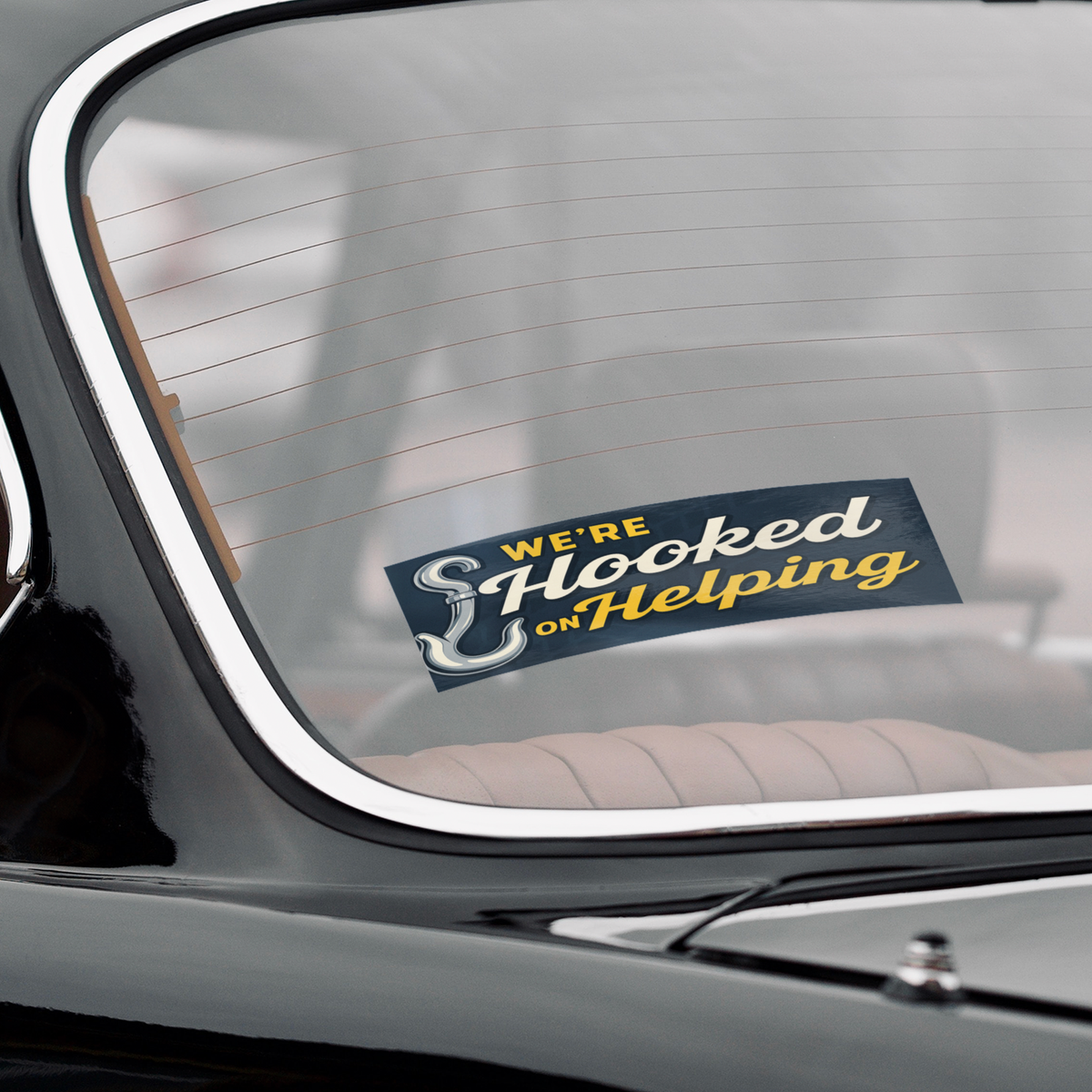 Were_Hooked_On_Helping_Others_WhiteBumperSticker-Windshield_Mockup.png